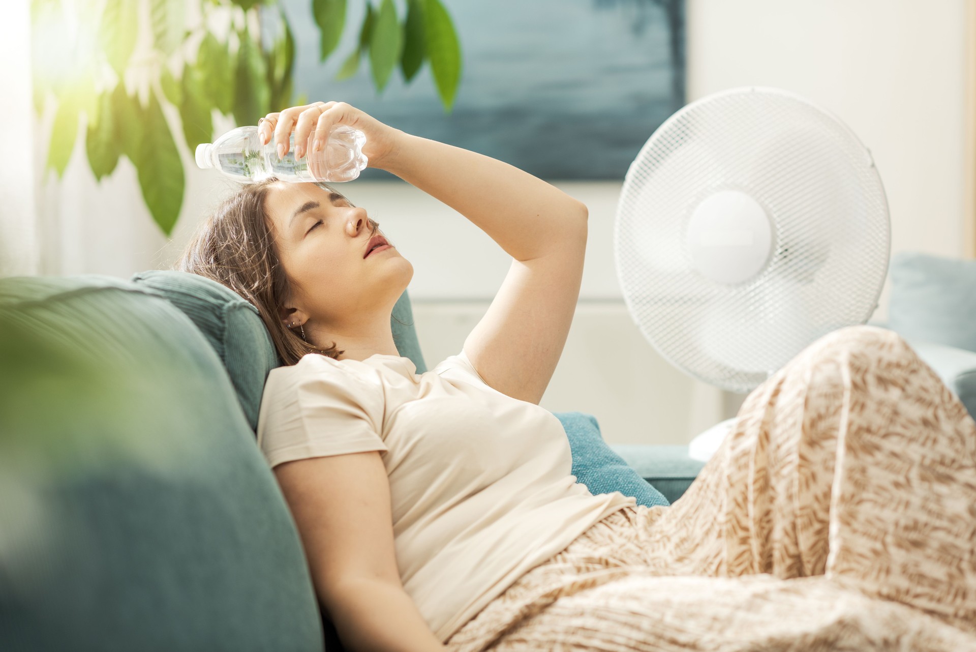 Young woman suffering from the heat