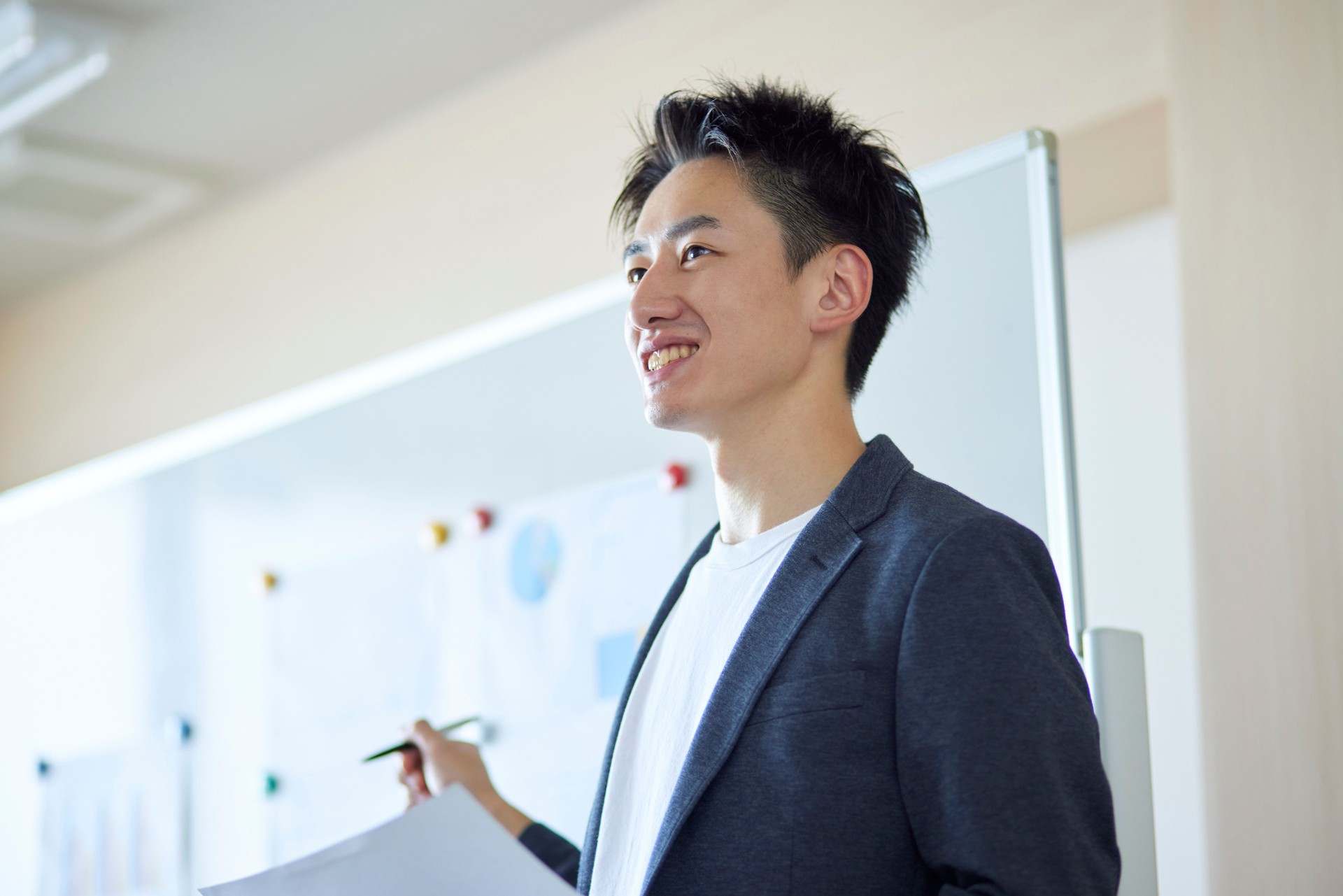 Young Japanese business giving a presentation